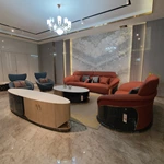 Dusty Blue Leather Lounge Chair with Elevated Headrest and High-Gloss Dark Back Panel